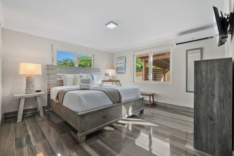 King bedroom with AC and calm setting for restful nights in Aruba
