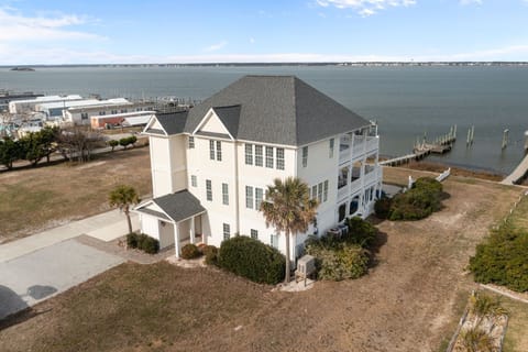 Magnificent waterfront property positioned directly on the bay with private dock access and panoramic water views from this coastal location.