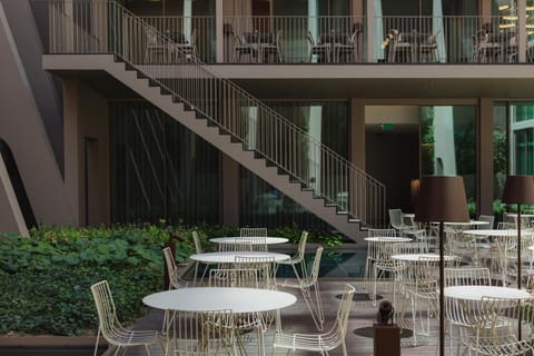Unwind with morning coffee in the serene garden courtyard.