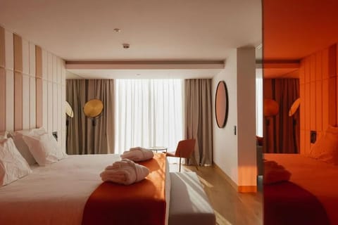 Stretch out on crisp linens as sunlight fills the room.