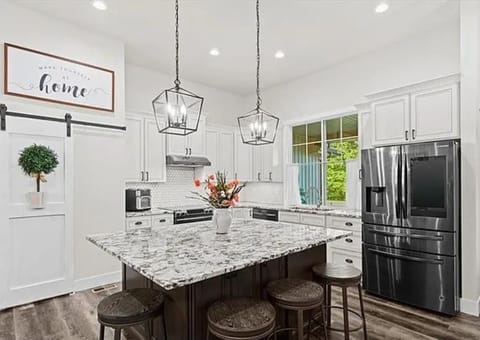 The chef’s kitchen is the true centerpiece. 