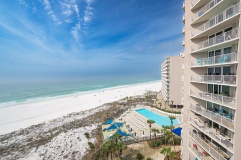 Oceanfront balcony with stunning beach and pool views
