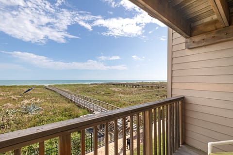 Start your day with peaceful beach and dune views from your private balcony