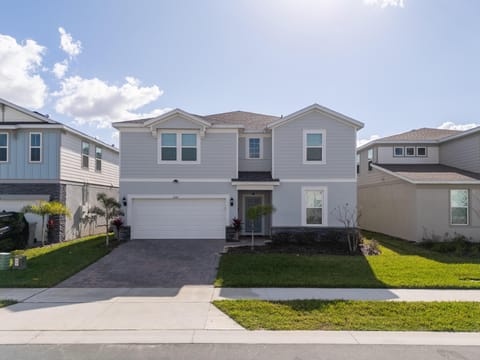Spacious modern home with bright curb appeal and garage