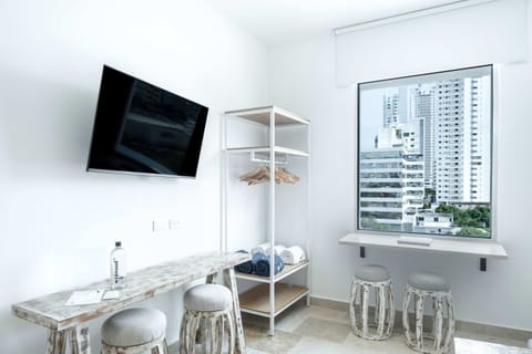 Smart TV and desk for work or leisure.
