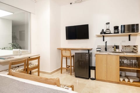 Comfortable room with television.