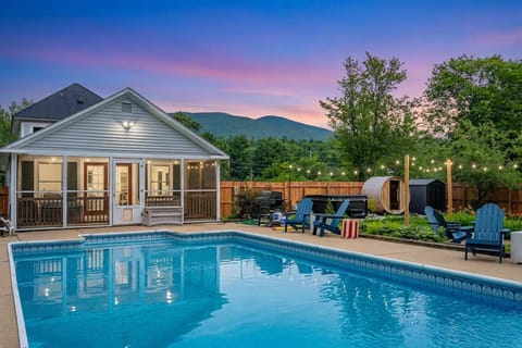 Swim under a painted sky with the mountains as your backdrop.