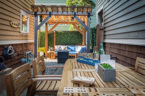 Gather under the pergola for sunset drinks, outdoor games