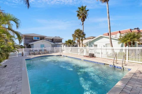 Imagine waking up, grabbing your coffee, and strolling 45 steps to the beach for morning waves — then cooling off with a refreshing dip in the pool just steps from your door.