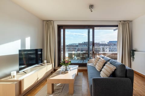 Apartment, City View | Living area | Flat-screen TV