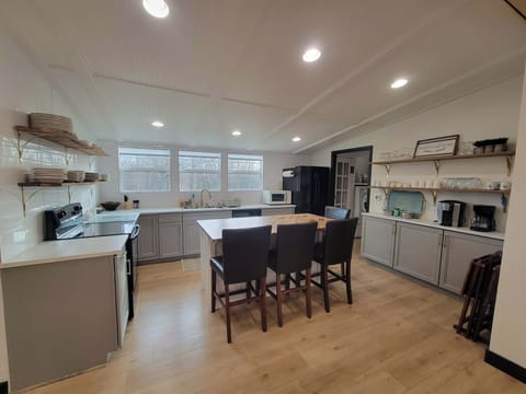 Spacious open kitchen with eat-in island and dedicated coffee bar