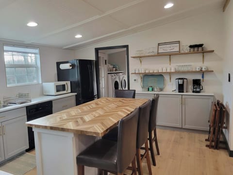Spacious open kitchen with eat-in island and dedicated coffee bar