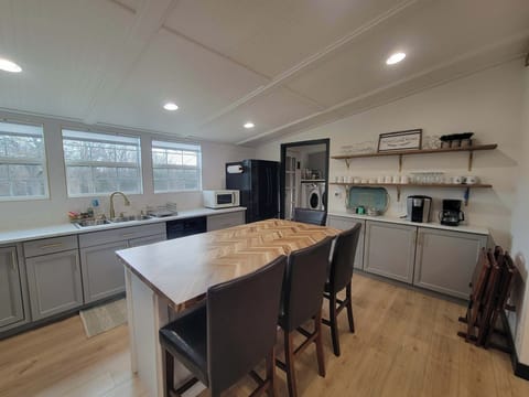 Spacious open kitchen with eat-in island and dedicated coffee bar