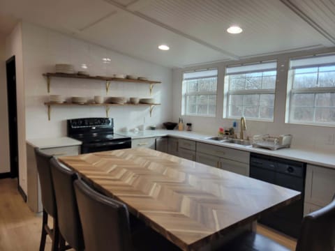Spacious open kitchen with eat-in island and dedicated coffee bar