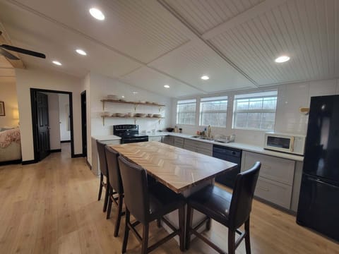 Spacious open kitchen with eat-in island and dedicated coffee bar