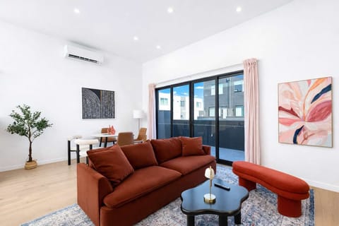 Panoramic Italian Minimalism: Sun-drenched Living Space.