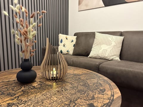 Furniture, Interior Design, Brown, Living Room, Coffee Table, Couch, Natural Material, Design, Lamp