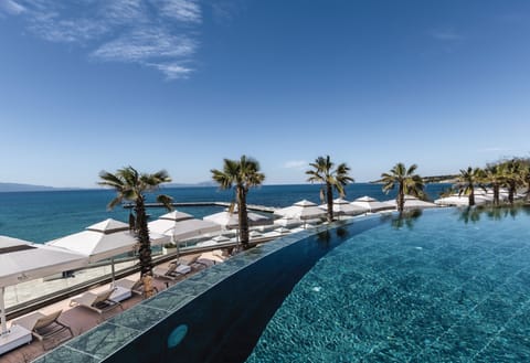 Indoor pool, 2 outdoor pools, open 8:00 AM to 7:00 PM, pool umbrellas