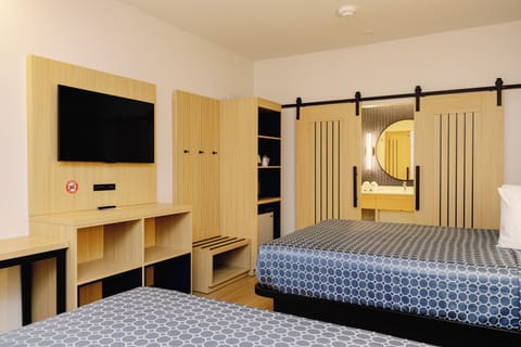 Memory foam beds, desk, laptop workspace, blackout drapes