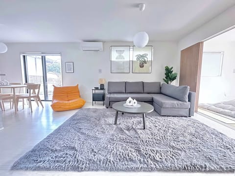 Living Room with Sofa & Dining Area