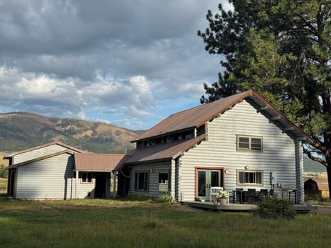 Cabin view from backyard.  Nice deck for outside dining and cocktails.