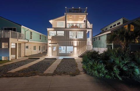 House illuminated at night.