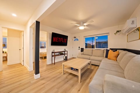 Spacious open-concept living area with natural light