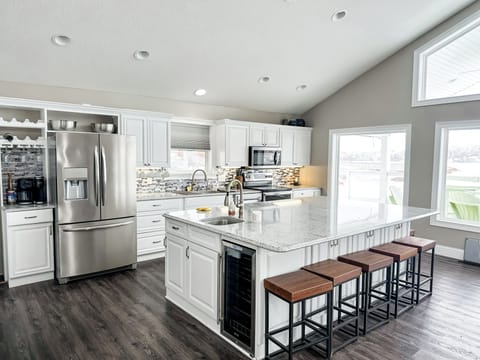 Seating for eight at the giant bar makes the perfect spot for gabbing and snacking. 