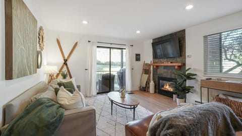 Warm wood accents and mountain views. The perfect spot to unwind by the fireplace after a day of adventure.