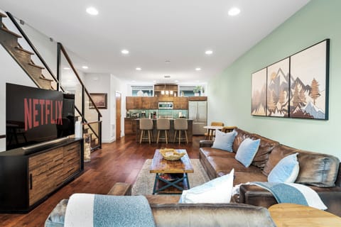 The large TV and comfy seating make it ideal for entertainment. 