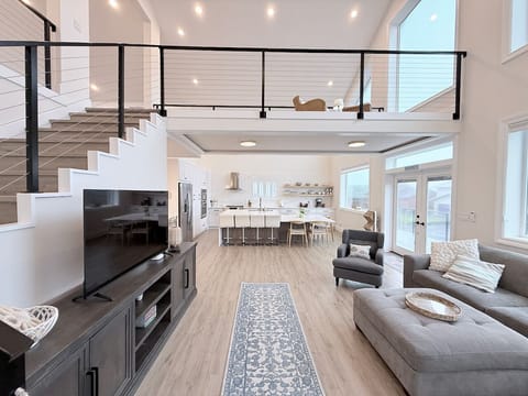 Perfect shot of the living are connected to the kitchen.