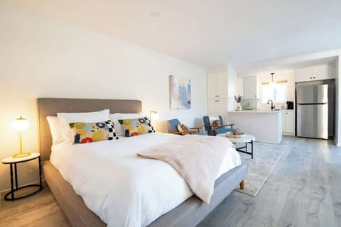 This bright, beachside retreat is your next home away from home just steps from the ocean