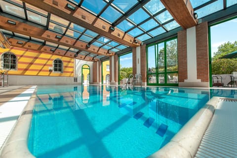 Indoor pool, open 8:30 AM to 10:30 PM, sun loungers