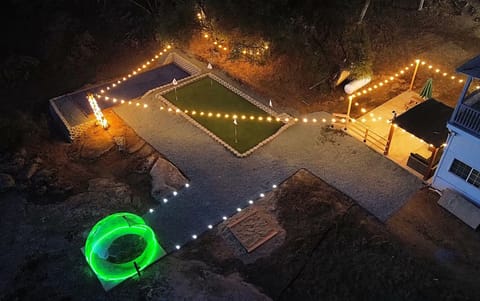 Experience our ultimate private resort! Challenge friends to mini-golf or bocce ball, then stargaze from our unique geodesic dome. As evening falls, unwind under the pergola with sunset cocktails. Your perfect retreat awaits—book your stay today!