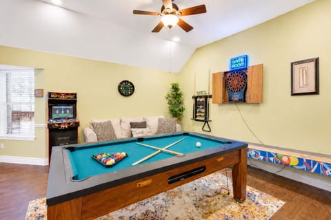Interoir game room, games, child friendly, climate control, couch, living area