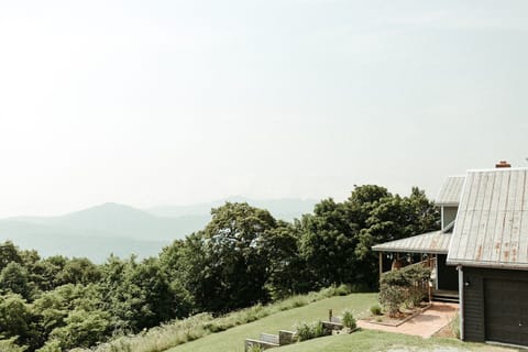 Scenic mountain overlook with wide open views, peaceful setting, and plenty of space for a family or group getaways at Overlook Barn Estate.