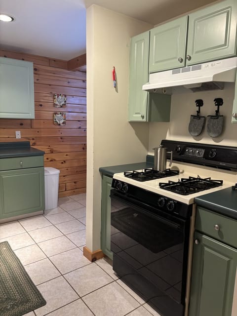 Full kitchen with modern appliances, perfect for cooking after a day of exploring nature