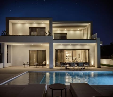 Luxury Villa, Balcony, Courtyard View | Pool | Outdoor pool, pool umbrellas, sun loungers