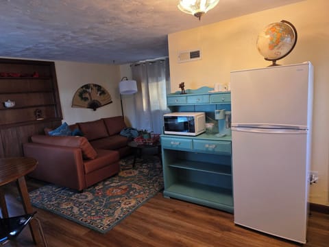 View from entry door of kitchen and living room.