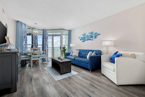 Beautiful and bright open living space with full floor to ceiling windows 