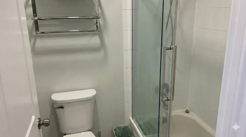 Sparkling clean bathroom with tub for post-ski relaxation.