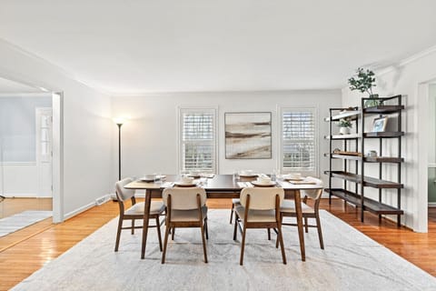 Spacious dining room with seating for family dinners and celebrations.