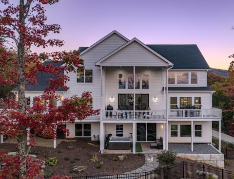 Stunning fall color and sunset views framing the home