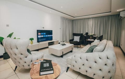 Family Apartment | Living area | Flat-screen TV