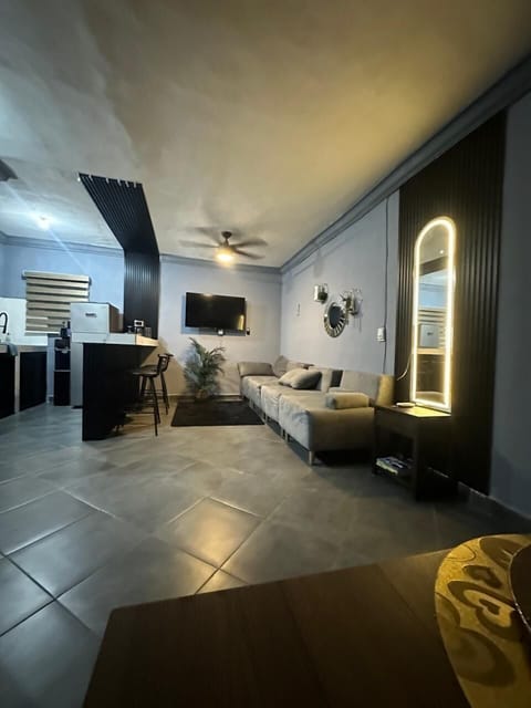Deluxe Apartment | Living area | Flat-screen TV