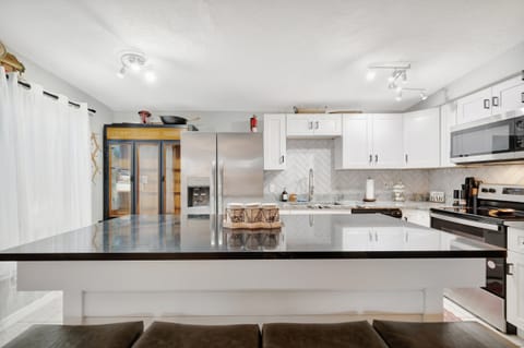 Expansive kitchen with oversized island for entertaining