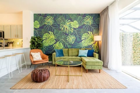 Living room with direct pool access.