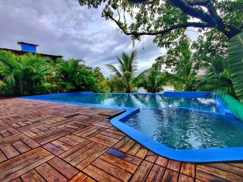 Outdoor pool, open 9:00 AM to 7:30 PM, pool umbrellas