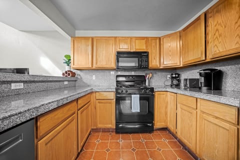 Well-equipped kitchen with modern appliances and generous counter space