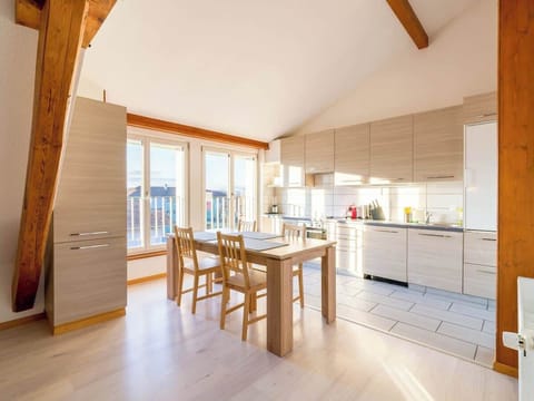 Bright open kitchen and dining area with natural light
